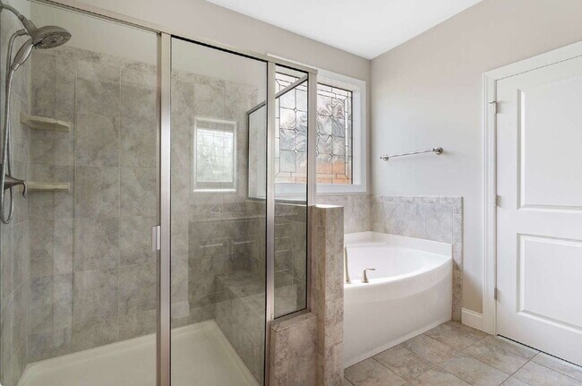 Building Photo - Luxurious 4-Bedroom Retreat with Third Floor Bonus Room & Fenced-in Backyard
