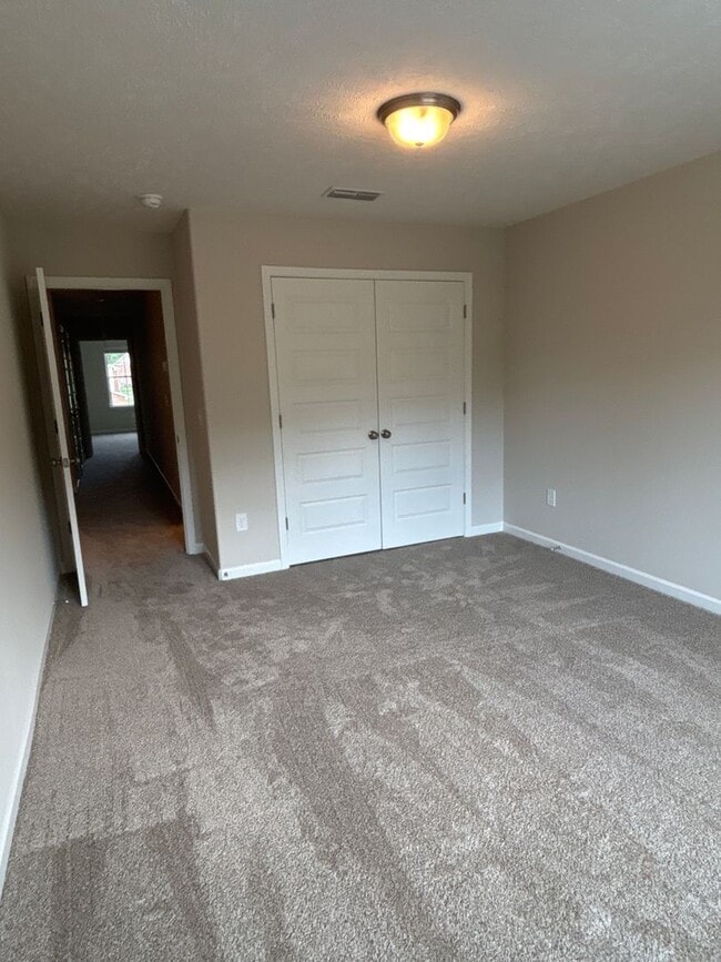 Building Photo - MOVE IN SPECIAL! - BRAND NEW 4 Bedroom Townhome in Shelbyville!