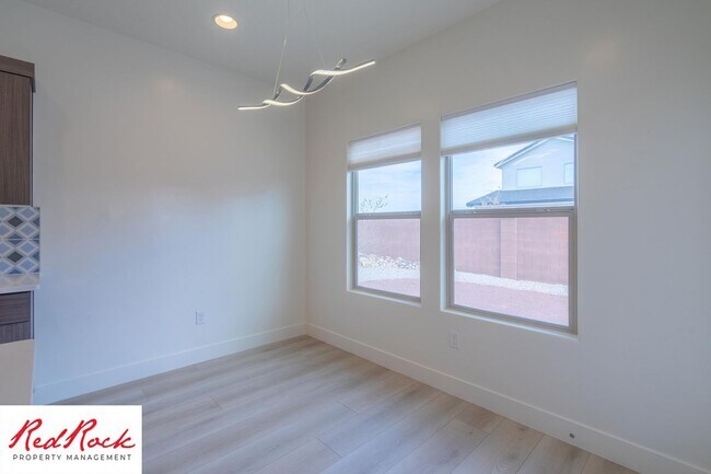 Building Photo - Comfort, Space & Style with a 3-Car Garage Small Dog Friendly!