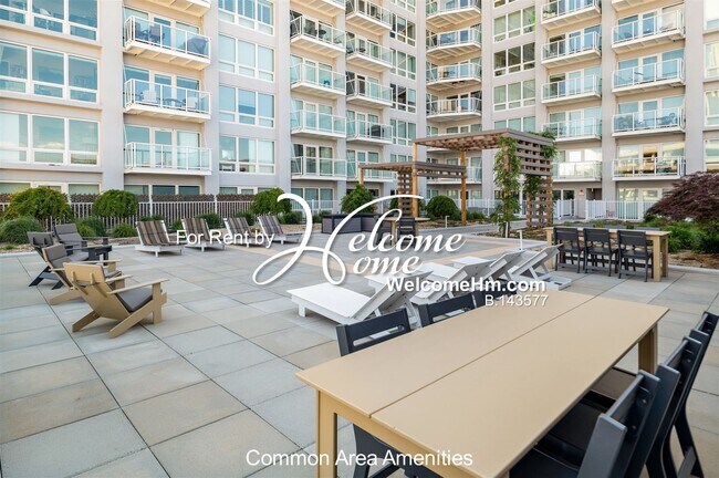 Building Photo - Coming Soon - Downtown High-rise Montage A...