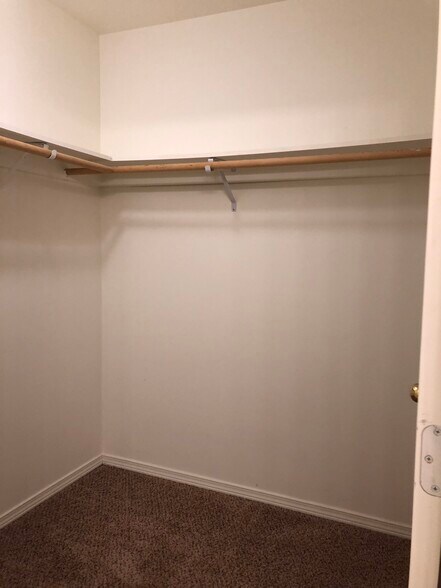 Walk IN Closet attached to Primary bedroom with full - 1747 Vela Ln SW