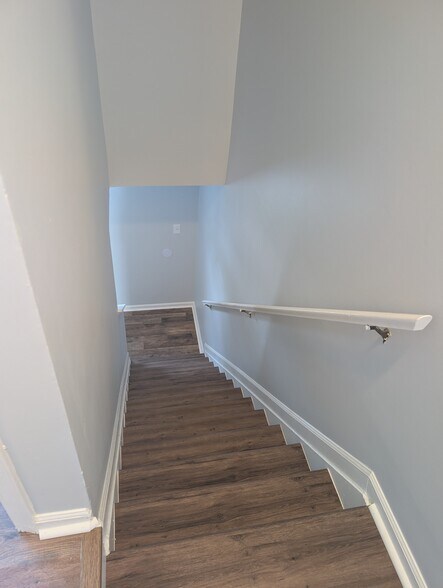 Stairs from Upstairs to Main area - 1109 Holmespun Dr