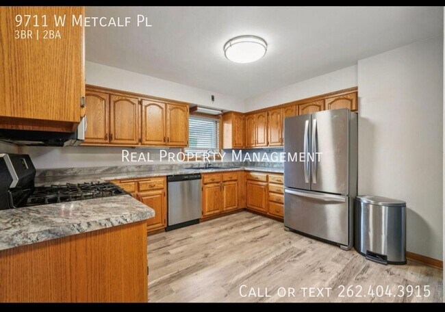 Building Photo - 9711 W Metcalf Pl