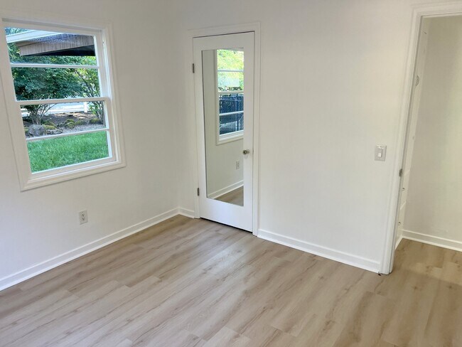 bedroom #1 looking at yard and closet - 4662 Carman Dr