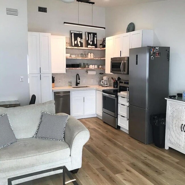 Building Photo - 50% off first months rent.  Gulf front com...