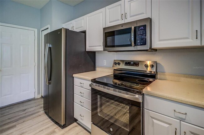 Building Photo - 6265 Ashbury Palms Dr