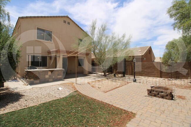 Building Photo - 43902 W Magnolia Rd