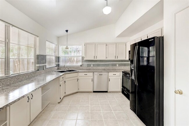 Building Photo - 16304 Kicking Bird Dr