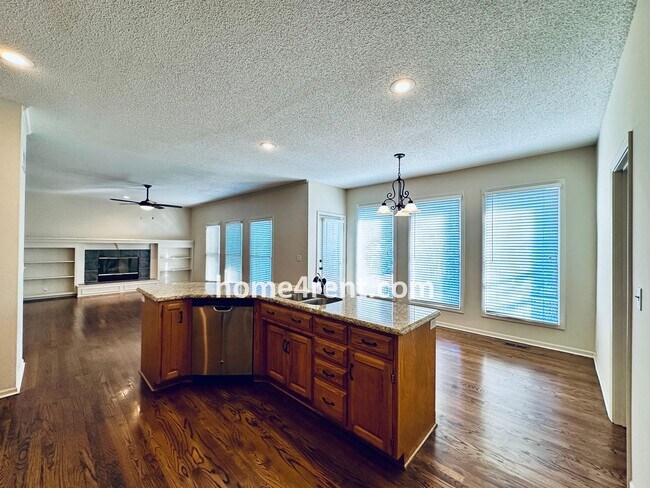 Building Photo - Blue Valley Northwest home on a cul-de-sac w/ granite counters, ss appliances and fenced yard!