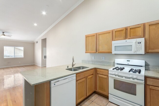 Building Photo - GATED SUMMERLIN CONDO/COMMUNITY POOL/SPA/ BASKETBALL COURT-2 CAR ATTACHED GARAGE!