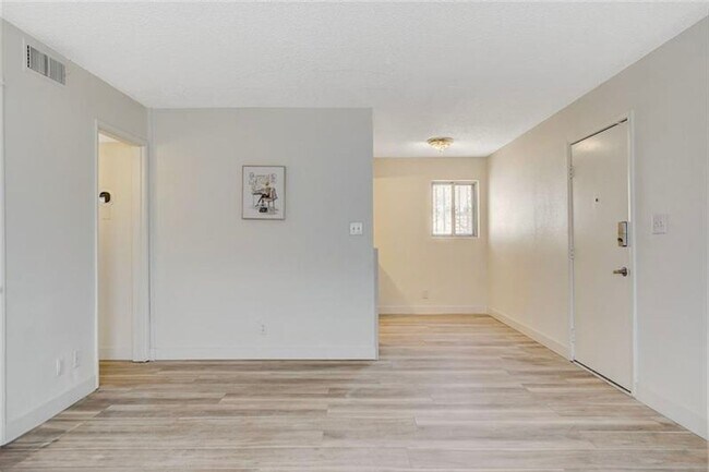 Building Photo - Completely Updated and Move-In Ready, 2 bedroom, 1 bath first floor unit!