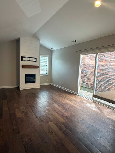 Living Room with Electric Fireplace - 2020 Sidney St
