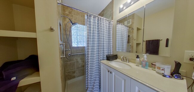 Building Photo - 3D Tour Available! West Side Home + Sunroom + Attached Garage + Pets Welcome + Washer & Dryer!  A...