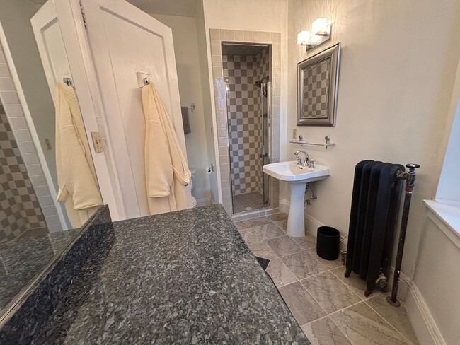 Building Photo - Vintage Beauty, Modern Living – Historic Condo Awaits!