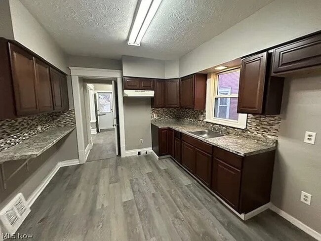 Building Photo - Spacious 4-Bedroom Home in Cleveland