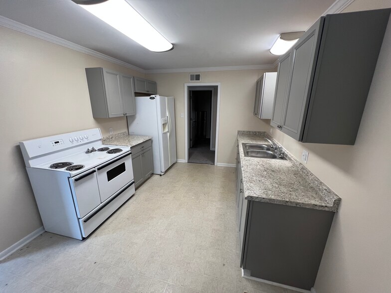 Kitchen standing in dining area. - 307 Maple St