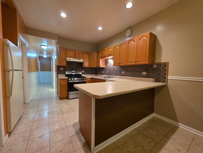 Building Photo - 6739 S Merrill Ave