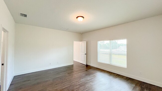 Building Photo - AVAILABLE NOW! 4 BD/2BA Home in Beautiful Palm Bay!! Wonderful home ready for move-in.