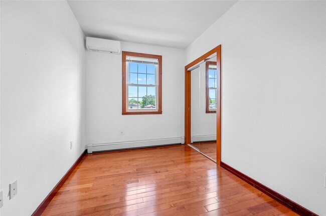 Building Photo - 38-42-42 216th St