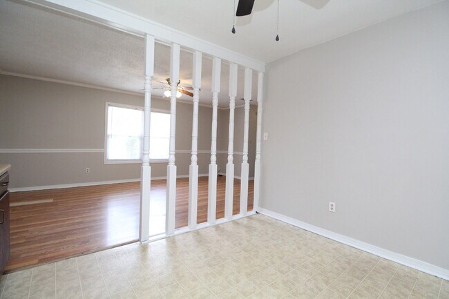 Building Photo - Spacious Bellview 2BR/1.5BA Duplex with Large New Front Deck, Fenced Backyard & Covered 2-Car Car...