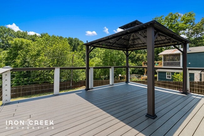 Building Photo - Beautifully Updated Three-Bedroom with Koi...