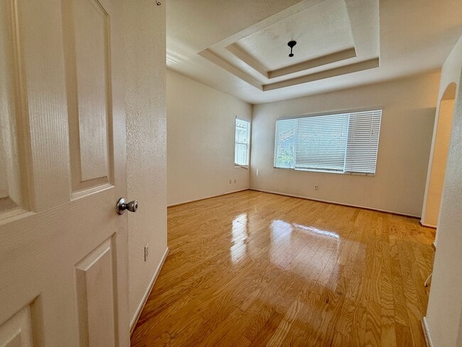 Building Photo - Spacious 3 Bedroom 2.5 Bath Townhouse with Private Garden Patio & a Community Pool/Spa! Attached ...
