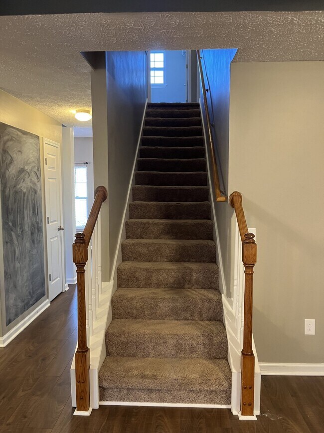 Building Photo - "Spacious 3-Bedroom Townhouse Retreat with Fireplace & Hardwood Floors in Antioch!"