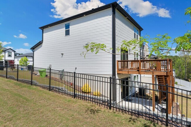 Building Photo - Move-In Ready 4BR Home | Deck, Patio & Open Concept Living