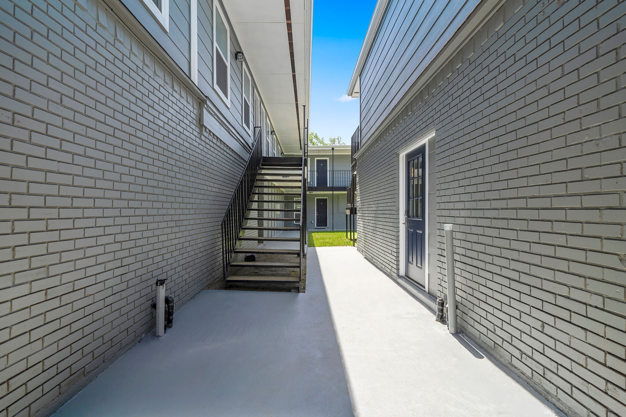 The door on the right is soon to be onsite laundromat! - 6403 Sloan St