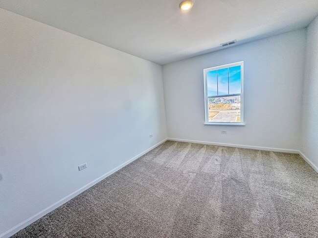 Building Photo - Step into modern living with this brand-ne...