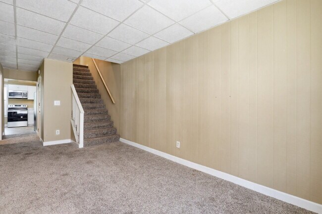 Building Photo - This well-maintained 4-bedroom, 2-bath duplex offers a spacious layout with all the comforts of h...