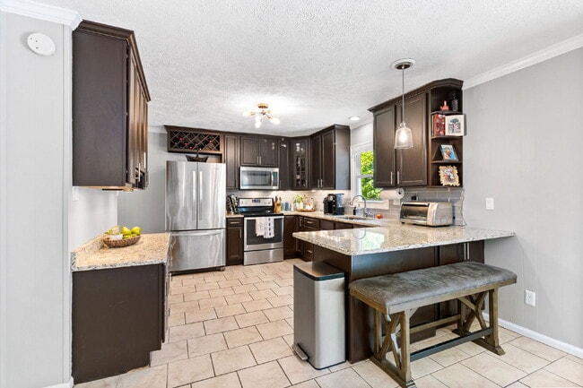 Building Photo - Spacious 4-Bedroom Haven with 3 Full Baths...