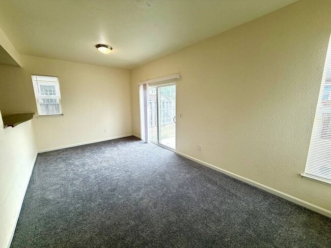 Building Photo - Freshly Painted w/ New Carpets 3 Bedroom, 2 Bath With Attached Garage