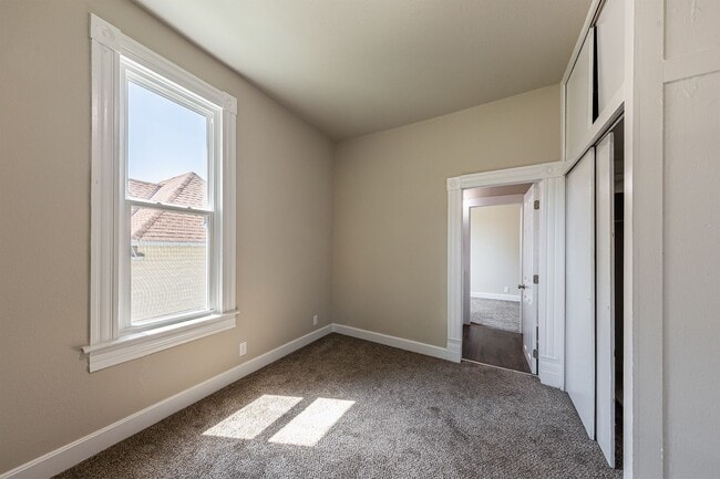 Building Photo - Remodeled 2-Bedroom Bungalow with Detached Garage & Large Backyard