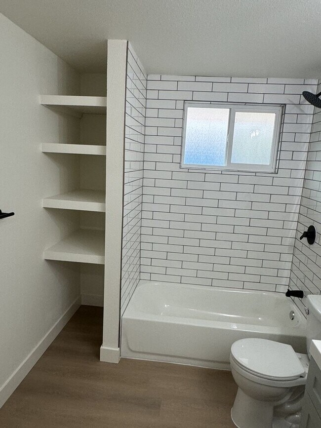 Building Photo - Completely Renovated 2BD/1BA Condo w Attached Garage
