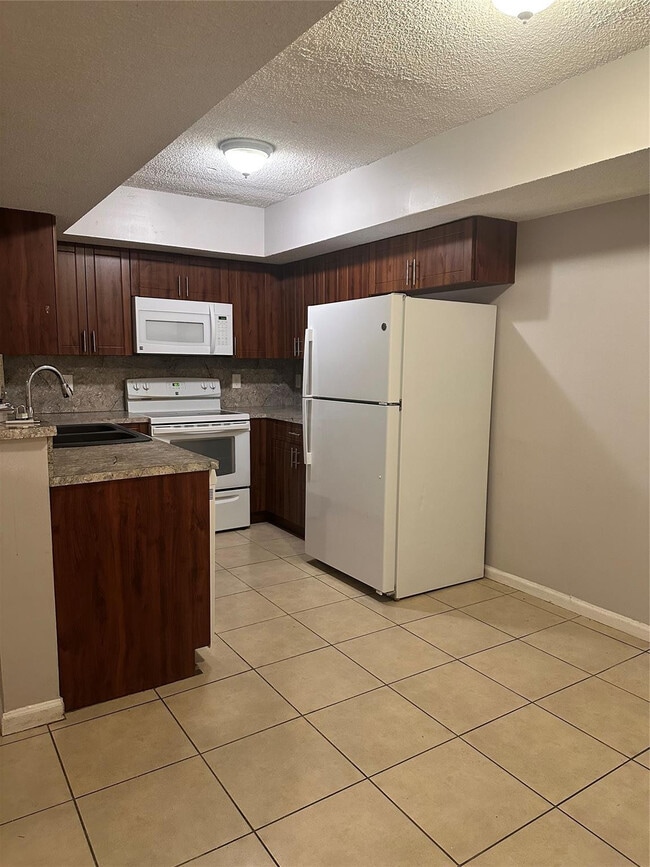 Building Photo - 5590 NW 61st St