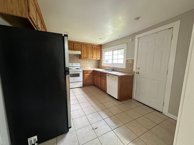 Building Photo - Welcome to this charming 3-bedroom, 2-bathroom home located in Atkins, AR