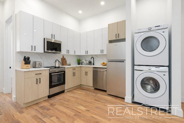 Building Photo - Brand New 4 Bed, 2 Bath with In-Unit Laundry, Private Balcony & Central Air