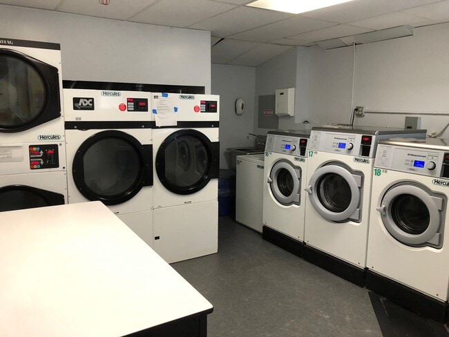 Building Photo - 10025 Queens Blvd