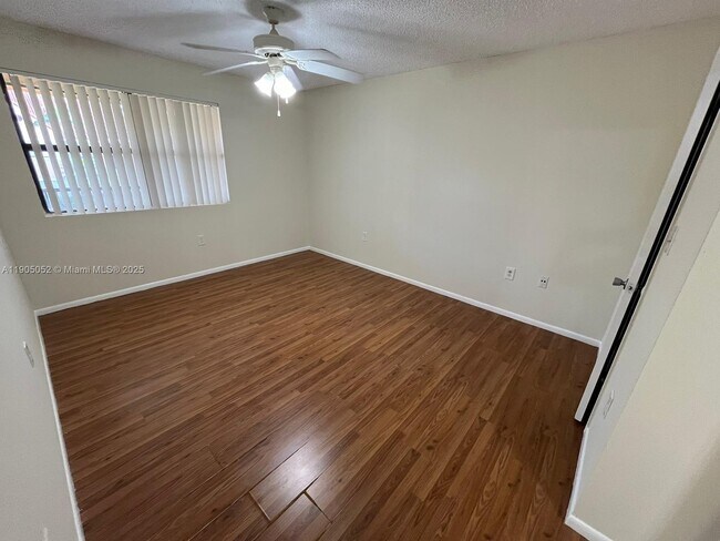 Building Photo - 10500 SW 155th Ct