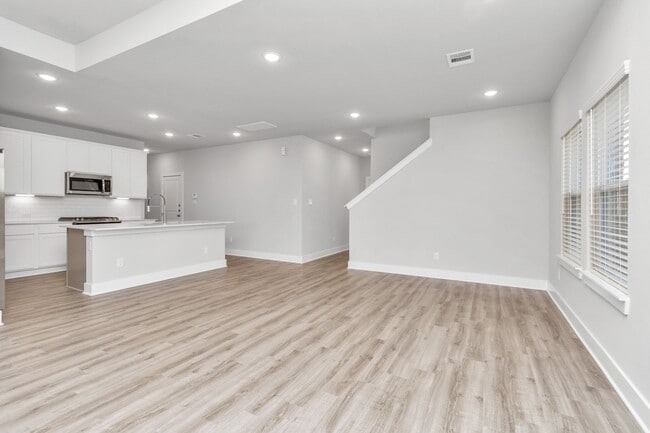 Building Photo - Welcome to the Redbud — A Fresh Take on Modern Living.