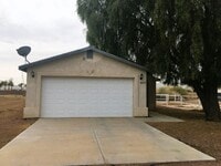 Building Photo - 3-Bedroom Single Family Home with Central Cooling, Attached Garage, and Tile Flooring