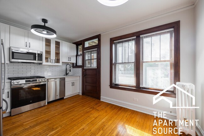 Building Photo - 3126.5 North Spaulding Ave. Unit 1E