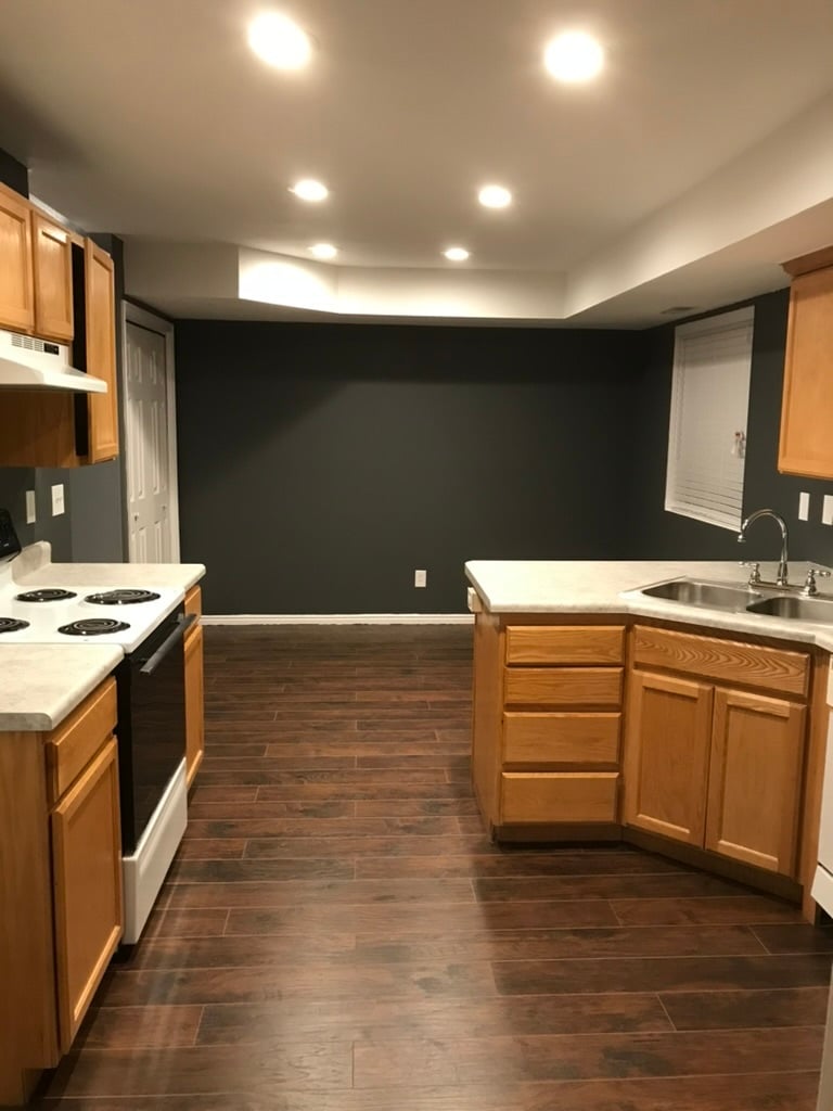Look into dining room from kitchen (all appliances have been replaced w/ stainless steel appliances) - 436 W 7th Street
