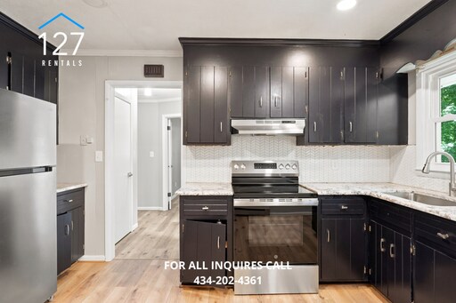 Building Photo - Charming 2 Bed/1 Bath Property in Quiet Neighborhood