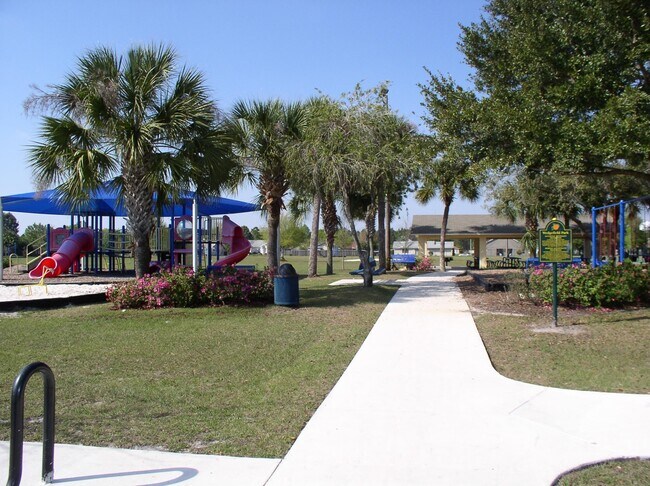 Building Photo - LARGE AND SPACIOUS 4/3 HOME IN EAST ORLANDO WEDGEFIED COMMUNITY