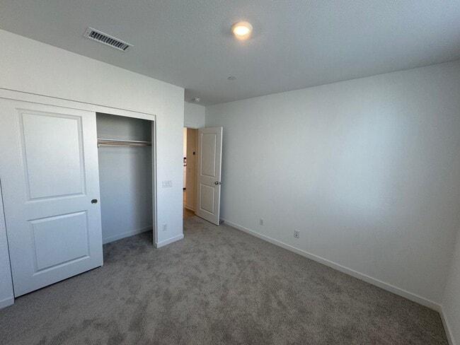 Building Photo - Brand New 1 bedroom, 1 bath Townhome with 2 car tandem garage for lease