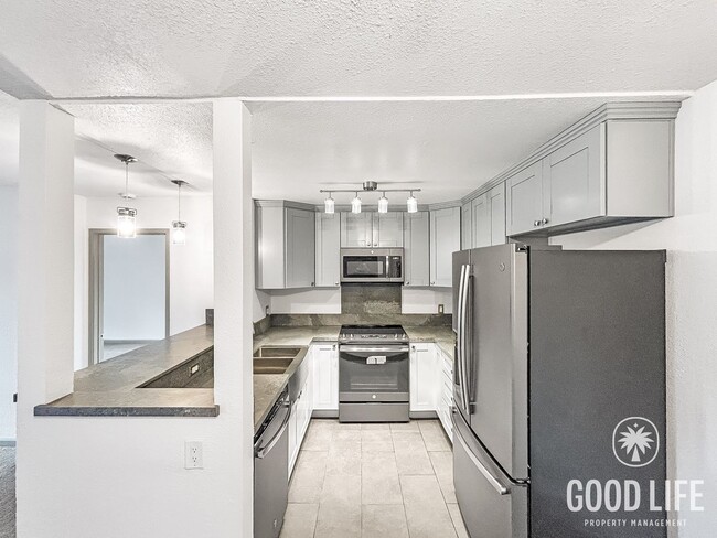 Building Photo - Spacious 2-Bed / 2-Bath Condo in Mission Ridge — Resort-Style Living in San Diego!