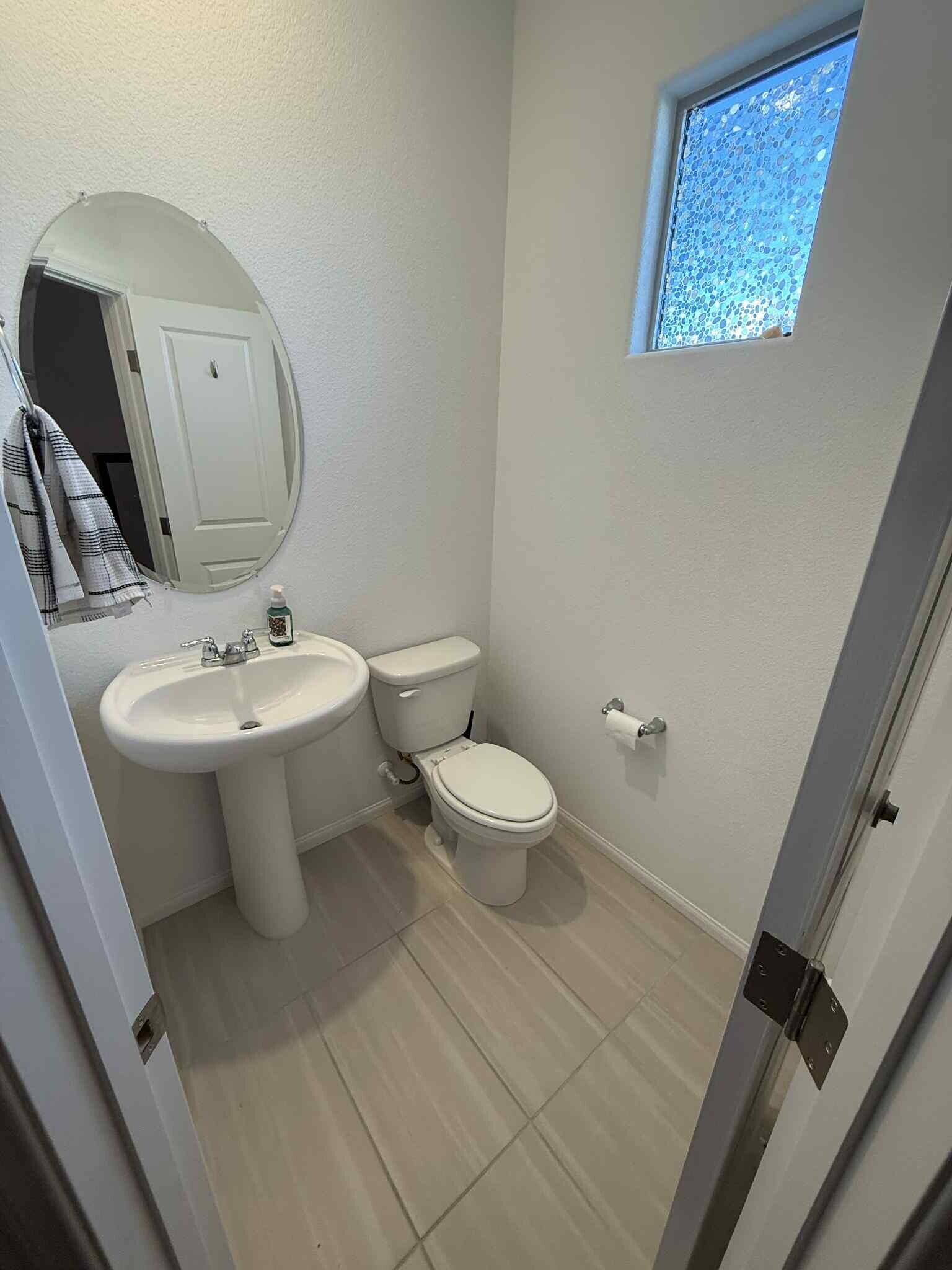 downstairs half bath - 5924 Tomsik St