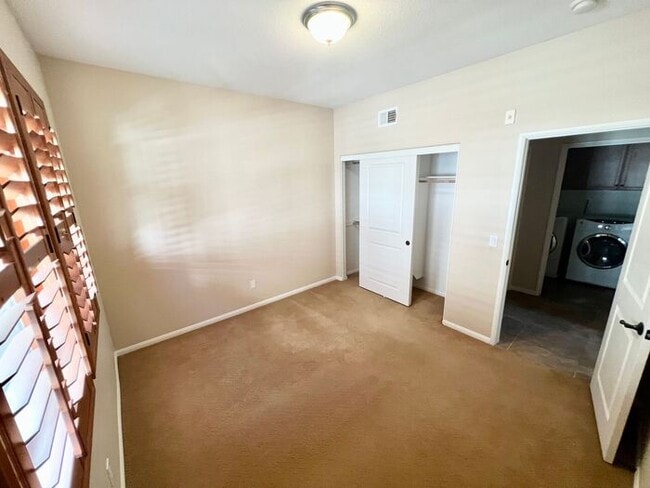 Building Photo - Resort-Style Living with Private Balcony Near Community Pools